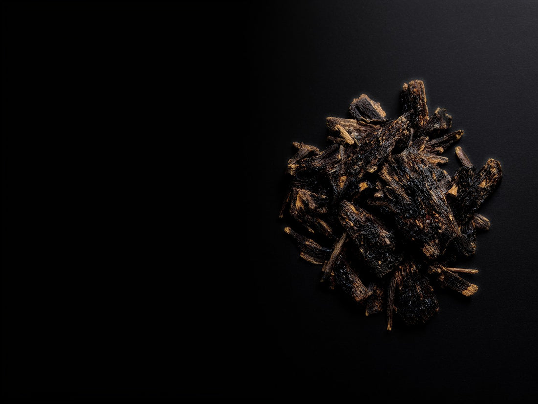 Dark resinous agarwood chips
