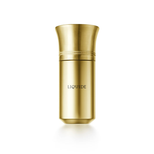 Flacone dorato di profumo LIQUIDE GOLD di LIQUIDES IMAGINAIRES su sfondo scuro
