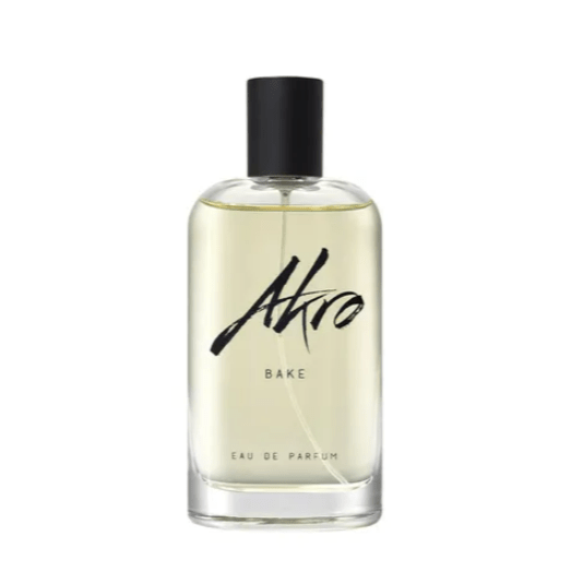 "Bottiglia di profumo Bake di Akro da 100 ml, fragranza unisex gourmand con note di torta appena sfornata, vaniglia e zucchero, su sfondo caldo e goloso."