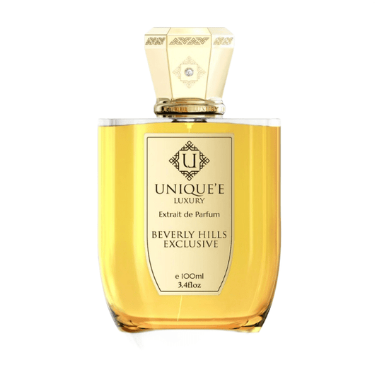 "Flacone di Unique'e Luxury Beverly Hills Exclusive, una fragranza lussuosa che cattura l'eleganza e il glamour di Beverly Hills con note sofisticate e raffinate, perfetta per chi cerca un'esperienza esclusiva."