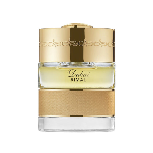 "Dubai Rimal di The Spirit of Dubai – fragranza orientale calda e speziata ispirata alle dune del deserto, con note di cannella, oud, ambra, legni esotici e resine preziose."