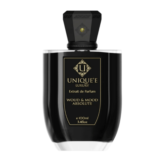 "Flacone di Unique'e Luxury Wood & Mood Absolute, una fragranza sofisticata che unisce le note legnose e avvolgenti per un'esperienza olfattiva esclusiva, elegante e intensa."